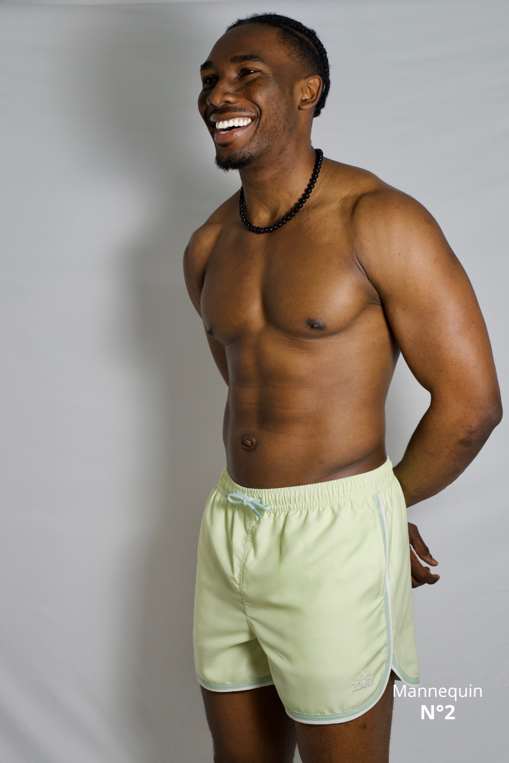 Short de bain pour homme vert claire, lime cream. Filet ultra doux et confortable. Tissus 100% recyclé. 