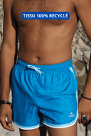 Short de bain bleu pour homme, idéal pour l’été. Modèle Nisos signé LOME, tissu recyclé et séchage rapide